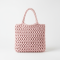 Handmade pastel pink crochet bag